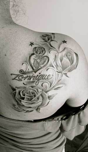 Tameka had an old school piece on her back and we put together three roses
